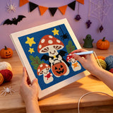 Broderie punch needle en cours sur la toile du champignon à la cape noire