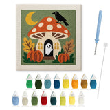 Contenu du kit punch needle amanite fantôme : toile sur cadre, aiguilles et fils de laine