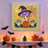 Tableau punch needle champignon sorcier accroché au mur dans une déco d'Halloween