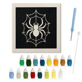 Contenu du kit punch needle Halloween araignée : toile sur cadre, aiguilles et fils de laine