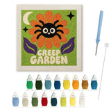 Contenu du kit punch needle araignée fleur : toile sur cadre, aiguilles et fils de laine