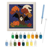 Contenu du kit punch needle Halloween : toile sur cadre, aiguilles et fils de laine
