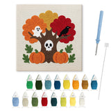 Contenu du kit punch needle arbre au crâne : toile sur cadre, aiguilles et fils de laine