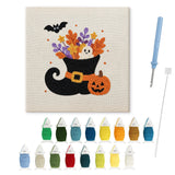 Contenu du kit punch needle Halloween botte sorcière : toile sur cadre, aiguilles et fils de laine