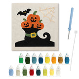 Contenu du kit punch needle citrouilles Halloween : toile sur cadre, aiguilles et fils de laine
