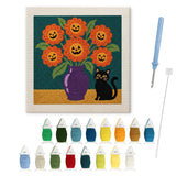 Contenu du kit punch needle bouquet et chat : toile sur cadre, aiguilles et fils de laine