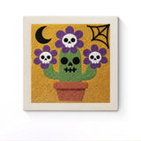 Punch Needle Halloween Cactus Crâne : tableau brodé terminé sur son cadre