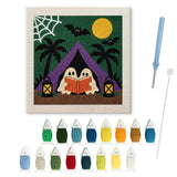 Contenu du kit punch needle fantômes camping : toile sur cadre, aiguilles et fils de laine