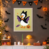 Tableau punch needle canard déguisé en chauve-souris accroché au mur dans une déco d'Halloween
