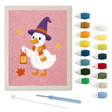 Contenu du kit punch needle canard lanterne : toile sur cadre, aiguilles et fils de laine