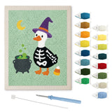 Contenu du kit punch needle canard squelette : toile sur cadre, aiguilles et fils de laine