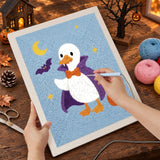 Broderie punch needle en cours, aiguille en main, sur la toile du canard aux petits crocs