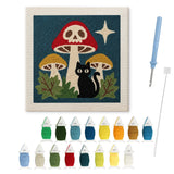 Contenu du kit punch needle champignon crâne : toile sur cadre, aiguilles et fils de laine