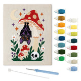 Contenu du kit punch needle champignon hanté : toile sur cadre, aiguilles et fils de laine