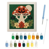 Contenu du kit punch needle champignon rieur : toile sur cadre, aiguilles et fils de laine