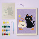 Toile imprimée numérotée et tableau punch needle chat aux bonbons terminé