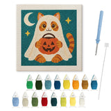 Contenu du kit punch needle chat citrouille : toile sur cadre, aiguilles et fils de laine