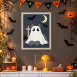 Tableau punch needle chat fantôme au cimetière accroché au mur dans une déco d'Halloween