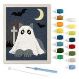 Contenu du kit punch needle chat cimetière : toile sur cadre, aiguilles et fils de laine