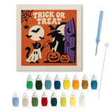 Contenu du kit punch needle chat déguisé : toile sur cadre, aiguilles et fils de laine