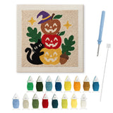 Contenu du kit punch needle chat et potirons : toile sur cadre, aiguilles et fils de laine