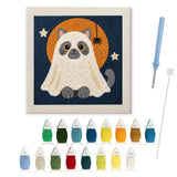Contenu du kit punch needle chat fantôme : toile sur cadre, aiguilles et fils de laine