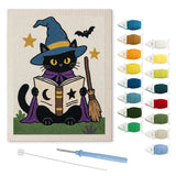 Contenu du kit punch needle chat grimoire : toile sur cadre, aiguilles et fils de laine