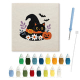 Contenu du kit punch needle Halloween chat noir : toile sur cadre, aiguilles et fils de laine