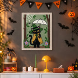 Tableau punch needle chat au parapluie accroché au mur dans une déco d'Halloween