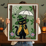 Tableau punch needle chat parapluie tenu en main pour montrer sa taille