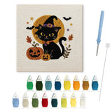 Contenu du kit punch needle Halloween chat noir : toile sur cadre, aiguilles et fils de laine