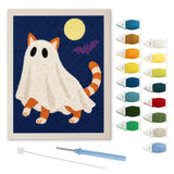Contenu du kit punch needle chat roux drapé : toile sur cadre, aiguilles et fils de laine