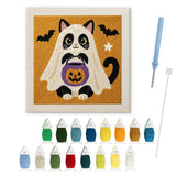 Contenu du kit punch needle chat déguisé : toile sur cadre, aiguilles et fils de laine