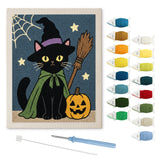 Contenu du kit punch needle chat citrouille : toile sur cadre, aiguilles et fils de laine