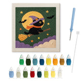 Contenu du kit punch needle Halloween chat sur balai : toile sur cadre, aiguilles et fils de laine