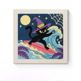 Punch Needle Halloween Chat Surfeur : tableau brodé terminé sur son cadre