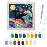 Contenu du kit punch needle chat surfeur : toile sur cadre, aiguilles et fils de laine