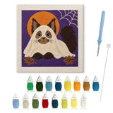 Contenu du kit punch needle Halloween : toile sur cadre, aiguilles et fils de laine