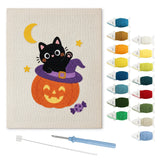 Contenu du kit punch needle chaton qui salue : toile sur cadre, aiguilles et fils de laine