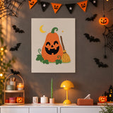 Tableau punch needle citrouille et balai de sorcière accroché au mur dans une déco d'Halloween