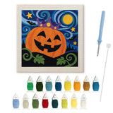 Contenu du kit punch needle citrouille roi : toile sur cadre, aiguilles et fils de laine