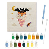 Contenu du kit punch needle Halloween cornet rose : toile sur cadre, aiguilles et fils de laine
