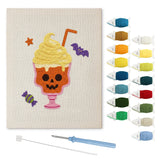 Contenu du kit punch needle coupe citrouille : toile sur cadre, aiguilles et fils de laine