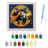 Contenu du kit punch needle couple sorciers : toile sur cadre, aiguilles et fils de laine