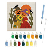 Contenu du kit punch needle couple tournesol : toile sur cadre, aiguilles et fils de laine