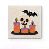Punch Needle Halloween Crâne Bougies : tableau brodé terminé sur son cadre