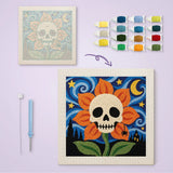 Toile imprimée numérotée et tableau punch needle crâne en fleur terminé