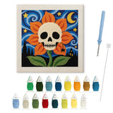 Contenu du kit punch needle fleur crâne : toile sur cadre, aiguilles et fils de laine