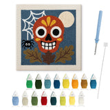Contenu du kit punch needle crâne en sucre : toile sur cadre, aiguilles et fils de laine