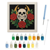 Contenu du kit punch needle crâne et roses : toile sur cadre, aiguilles et fils de laine